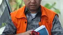 Mantan anggota DPRD Sumatera Utara Tahan Manahan Panggabean tiba di Gedung KPK, Jakarta, Senin (19/11). Tahan diduga menerima suap terkait menyetujui LPJ APBD 2012 dan Pengesahan Perubahan APBD 2013, 2014 dan 2015. (Merdeka.com/Dwi Narwoko)