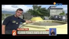 Relawan Perancis bantu korban bencana di Palu dapatkan air bersih dengan menyuling air sungai.