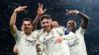 Pemain Real Madrid merayakan gol yang dicetak oleh Federico Valverde ke gawang Manchester City pada laga leg pertama babak 16 besar Liga Champions di Stadion Santiago Bernabeu (12/3/2026). (AP Photo/Jose Breton)