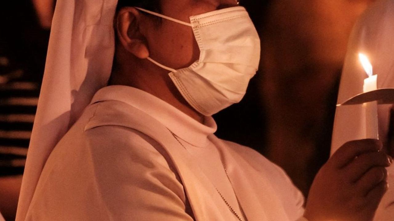 Tri Hari Suci merupakan tiga hari suci yang jatuh pada waktu Misa Kamis Putih, Jumat Agung, dan Sabtu Suci. Foto: Yasuyoshi CHIBA / AFP