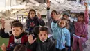 Saat ini, hampir seluruh anak di Gaza terlantar pendidikannya. (Bashar TALEB/AFP)