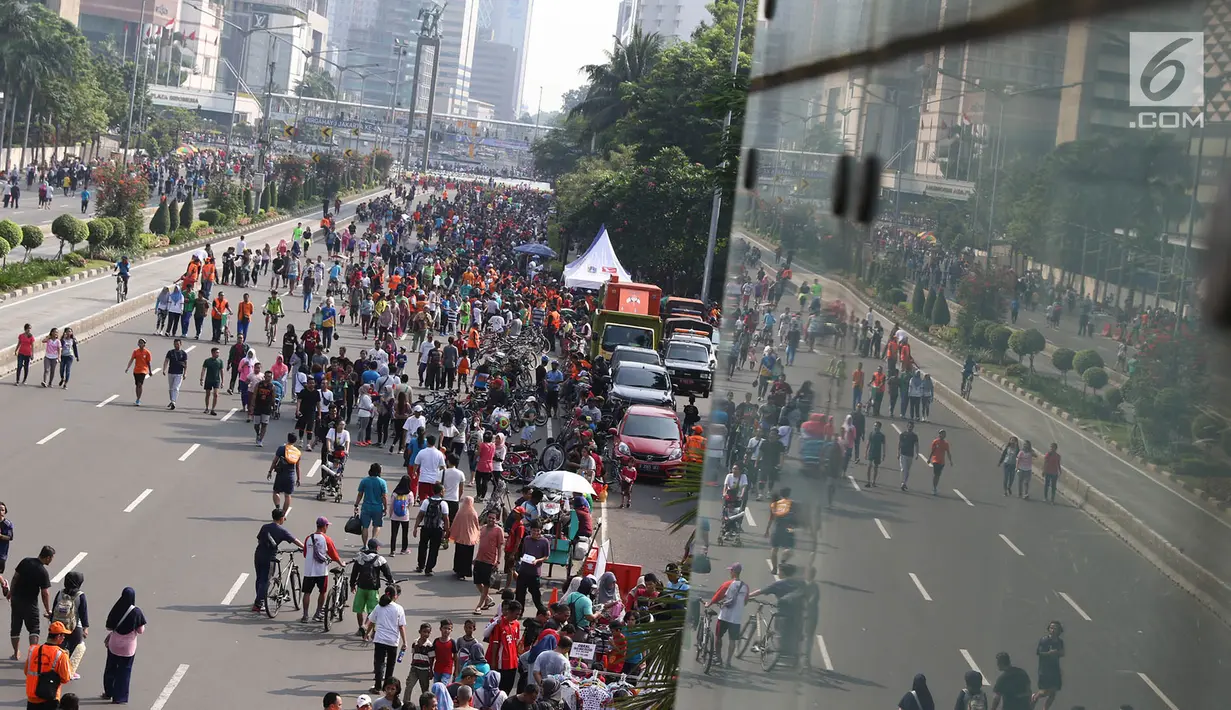 Warga kembali beraktivitas saat CFD di Jalan Jenderal Sudirman, Jakarta, Minggu (9/7).  Pasca libur lebaran, pelaksanaan CFD Jakarta kembali diberlakukan setiap hari Minggu, mulai pukul 06.00-11.00 WIB. (Liputan6.com/Immanuel Antonius)