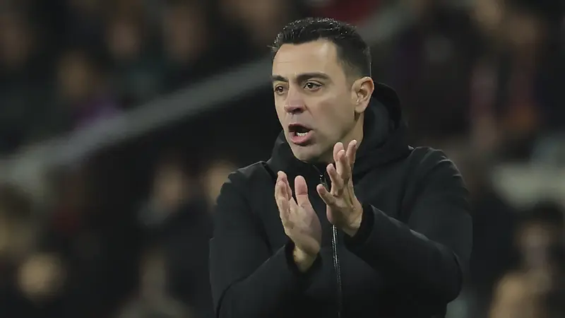 Setelah pembicaraan lebih lanjut dengan petinggi Barcelona, Xavi memutuskan pada 25 April 2024 untuk bertahan hingga masa kerjanya berakhir. (LLUIS GENE / AFP)