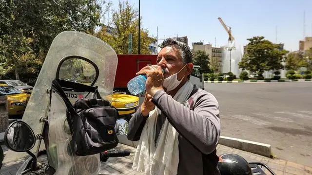 Suhu di sejumlah kota di Iran mencapai 50 derajat Celcius. (Foto: AFP)