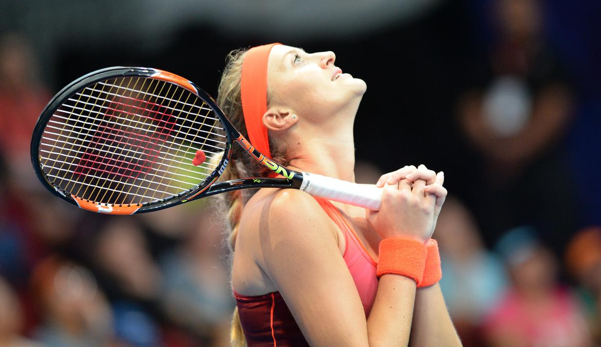 Ekspresi petenis Prancis, Kristina Mladenovic, saat bertanding melawan petenis Australia, Samantha Stosur, dalam turnamen International Premier Tennis League (IPTL) di Manila, Filipina, (7/12/2015). (AFP/Ted Aljibe)