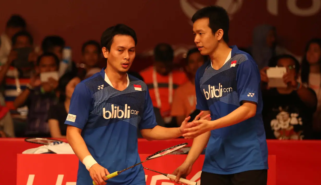 Ahsan/Hendra selalu berkomunikasi guna tetap menjaga fokus. (Bola.com/Arief Bagus)