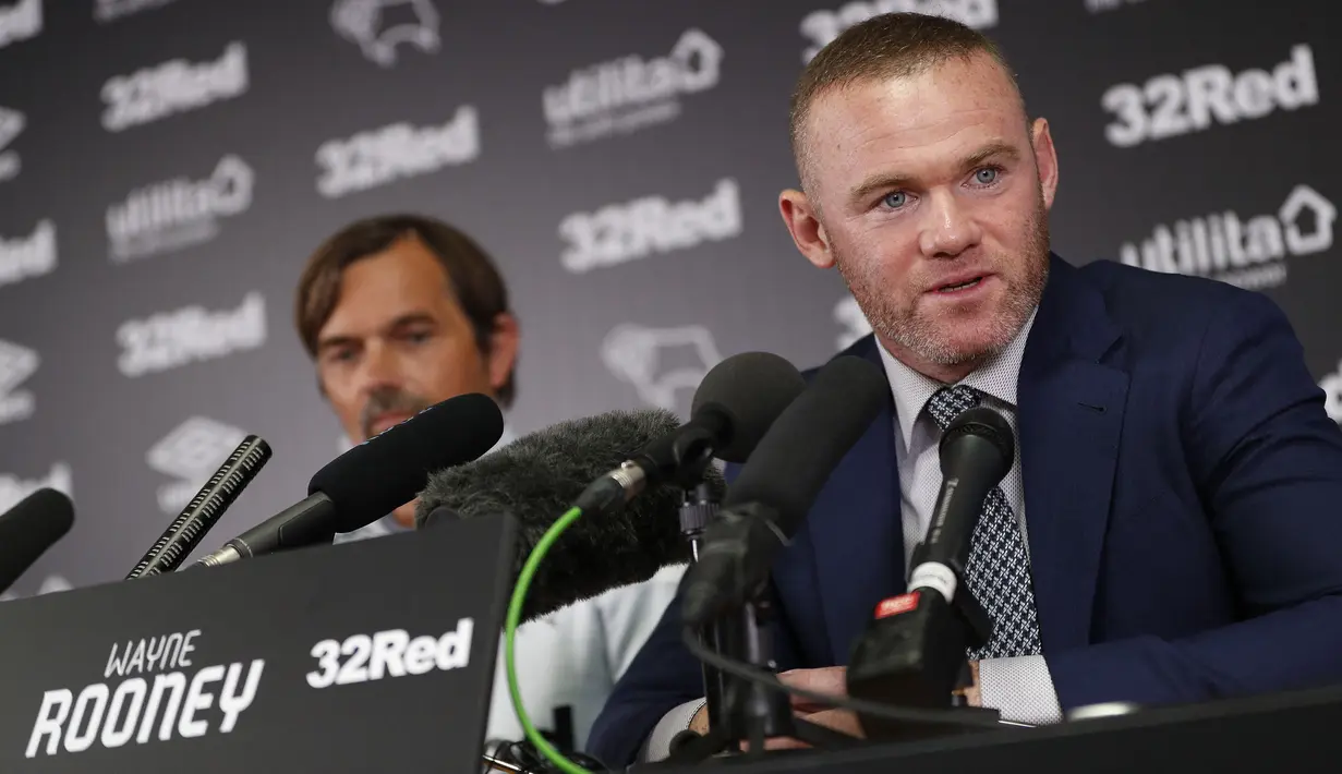 Wayne Rooney resmi ditunjuk sebagai pelatih Derby County pada tahun lalu. Semasa berkareir sebagai pemain, Rooney dan Ronaldo merupakan duet lini depan menakutkan Manchester United asuhan Sir Alex Ferguson. Mereka pernah meraih double winners pada 2008 silam. (AFP/Darren Staples)