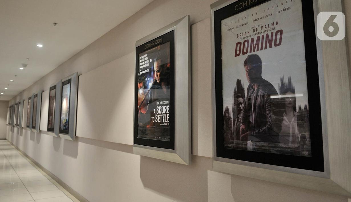Suasana Cinema XXI di salah satu pusat perbelanjaan kawasan Jakarta Timur ditutup sementara, Senin (23/3/2020). Guna mencegah penyebaran Covid-19, bioskop Cinema XXI di DKI Jakarta dan beberapa kota di Indonesia ditutup sementara mulai hari ini hingga 5 April 2020. (merdeka.com/Iqbal S. Nugroho)