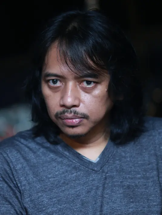 "Yang paling beda kali ini gak ada album baru. Ada alasan beberapa album distem beda," kata Budjana. (Adrian Putra/Bintang.com)