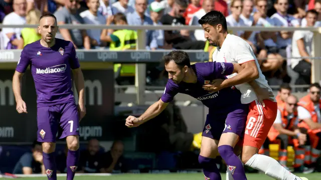 Milan Badelj dan Sami Khedira
