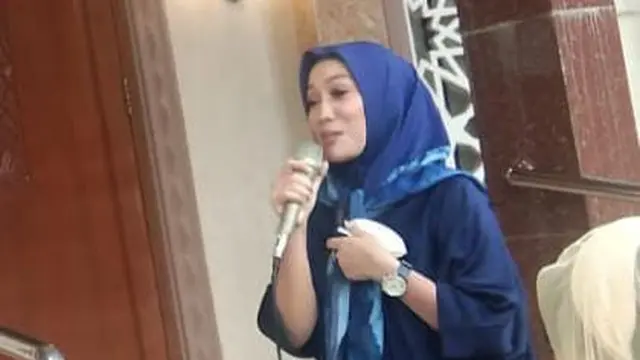 Diana Limbong berbagi kepada kaum Dhuafa