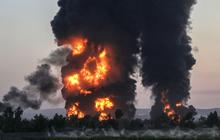 FOTO: Potret Dahsyatnya Kebakaran Kilang Minyak di Irak, Asap Hitam dan Tebal Membumbung Tinggi