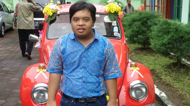 Kisah Penderita Down Syndrome Bagikan Kebahagiaan tanpa Memandang Agama