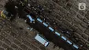 Suasana pemakaman jenazah dengan protokol covid-19 di TPU Rorotan, Jakarta, Rabu (14/7/2021). Jumlah penambahan kasus baru COVID-19 pada Rabu (14/7/2021) sebanyak 54.517 orang, sehingga total akumulatif sebanyak 2.670.046 orang di Indonesia terkonfirmasi positif corona. (Liputan6.com/Johan Tallo)