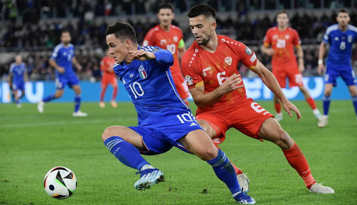 Sementara, Makedonia Utara menguntit di peringkat empat dengan tujuh poin dan sudah dipastikan absen dalam turnamen di Jerman tahun depan. (Filippo MONTEFORTE / AFP)