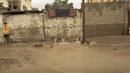 Seorang pemuda memeriksa genangan air di jalan rumah saat hujan deras di kamp pengungsi Shati, di Kota Gaza, Selasa (8/11/2022). Hujan deras menyebabkan banjir bandang di Jalur Gaza pada hari Selasa, di mana infrastruktur yang bobrok sering membuat air banjir tidak surut, memperpanjang kerusakan. (AP Photo/Adel Hana)