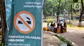 Warga beraktivitas di salah satu taman yang merupakan kawasan tanpa merokok di Jakarta, Selasa (24/6/2025). (Liputan6.com/Angga Yuniar)