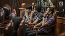 Ekspresi peserta saat mengikuti sidang putusan sengketa Pilpres 2019 di Gedung Mahkamah Konstitusi (MK), Jakarta, Kamis (27/6/2019). MK akan membacakan putusan sengketa Pilpres 2019 yang dimohonkan kubu Prabowo-Sandiaga. (Liputan6.com/Faizal Fanani)
