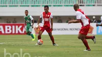 Penampilan striker PSM Makassar, Ferdinand Sinaga, dalam lanjutan TSC 2016 di Stadion Pakansari, Bogor Jawa Barat, Minggu (29/5/2016). (Bola.com/Nicklas Hanoatubun)