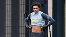 Bek Liverpool, Trent Alexander-Arnold tiba untuk sesi latihan tim di pusat pelatihan Axa di Kirkby, Liverpool, Inggris (14/9/2021). Liverpool akan bertanding melawan wakil Italia, AC Milan pada Grup B Liga Champions di Anfield. (AFP/Paul Ellis)