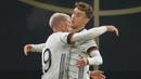 Penyerang Jerman, Luca Waldschmidt, merayakan gol yang dicetaknya ke gawang Republik Ceko pada laga uji coba di RB Arena, Kamis (12/11/2020) dini hari WIB. Jerman menang 1-0 atas Republik Ceko. (AFP/Odd Andersen)