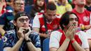 Fans tampak kecewa saat acara Roaring Night Arsenal vs Everton di Bulungan Theatre Building, Jakarta, Minggu (19/5/2024). (Bola.com/M Iqbal Ichsan)