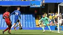 Pemain Chelsea Kai Havertz (kedua dari kiri) melakukan tendangan untuk mencetak gol ke gawang Watford pada pertandingan sepak bola Liga Inggris di Stamford Bridge, London, Inggris, 22 Mei 2022. Chelsea menang 2-1. (Glyn KIRK/AFP)