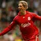 Fernando Torres. Striker Spanyol yang kini berusia 38 tahun dan telah pensiun pada Agustus 2019 bersama Sagan Tosu ini didatangkan Liverpool dari Atletico Madrid pada awal musim 2007/2008 dengan nilai transfer 38 juta euro. Ia langsung tampil tajam di musim pertamanya di Liga Inggris dengan mencetak 24 gol dan 4 assist. Bertahan hingga tengah musim 2010/2011 ia total tampil dalam 141 laga di semua ajang dengan torehan 80 gol dan 20 assist. Saat ini ia menjabat asisten manajer Atletico Madrid U-19 sejak Juli 2021. (AFP/Paul Ellis)