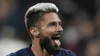 Penyerang timnas Prancis Olivier Giroud merayakan gol kedua untuk timnya yang dicetak ke gawang Austria pada laga lanjutan UEFA Nations League 2022/2023 di Srade de France, Jumat dini hari WIB (23/9/2022). Kylian Mbappe dan Olivier Giroud mencetak masing-masing satu gol untuk membawa Prancis mengalahkan Austria 2-0. (AP Photo/Christophe Ena)
