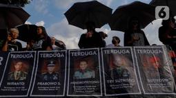 Mereka mendesak segera diadilinya pihak-pihak yang diduga terlibat dalam sejumlah kasus kekerasan dan pelanggaran berat HAM. (Liputan6.com/Herman Zakharia)