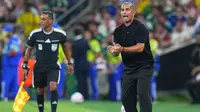 Dikutip dari laporan The Guardian, Federasi Sepak Bola Tunisia (FTF) dilaporkan memecat pelatih Sabri Lamouchi di tengah berlangsungnya Piala Dunia 2026. (AP Photo/Matias Delacroix)
