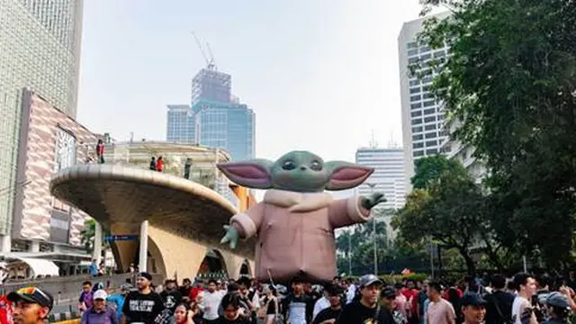 Grogu Raksasa Keliling Car Free Day Jakarta. (dok Disney Indonesia)