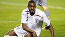 England's forward Carlton Cole reacts during a friendly football match against Spain at the Ramon Sanchez Pizjuan in Sevilla stadium on February 11, 2009. Spain won 2-0. AFP PHOTO / CRISTINA QUICLER 