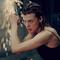The most beautiful female leads in action movies. (Photo: Milla Jovovich in Resident Evil (2002) - IMDb)