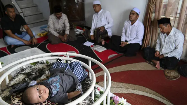 FOTO: Prosesi Aqiqah Menyambut Bayi yang Baru Lahir di Aceh