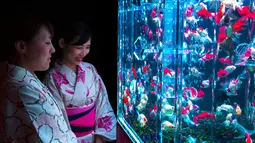 Menurut Becker, melihat ikan berenang memiliki efek sama seperti mendengarkan musik. Perhatian Anda akan teralihkan ke dalam sesuatu yang lebih baik. (REUTERS/Thomas Peter)