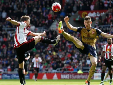 Arsenal gagal meraih poin penuh saat melawat ke markas Sunderland di Stadium of Light dalam laga Liga Inggris, Minggu (24/4/2016) malam WIB. (Action Images via Reuters/Lee Smith)