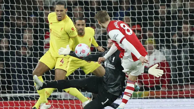 Foto: Bungkam Arsenal, Liverpool Tempel Ketat Manchester City di Puncak Klasemen Liga Inggris