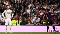 Kapten Real Madrid, Sergio Ramos, mengakui jika Barcelona tampil lebih baik pada laga pekan ke-26 La Liga Spanyol, Sabtu (2/3/2019). (AFP/OSCAR DEL POZO)