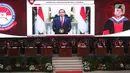 Presiden Republik Indonesia ke-7, Joko Widodo menyampaikan ucapan selamat kepada Presiden Republik Indonesia ke-5, Megawati Soekarnoputri saat Sidang Senat Terbuka Pengukuhan Guru Besar di Aula Merah Putih Universitas Pertahanan, Bogor, Jumat (11/6/2021). (Liputan6.com/Helmi Fithriansyah)