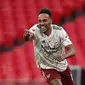 Selebrasi striker Arsenal Pierre-Emerick Aubameyang usai mencetak gol penentu pada adu penalti melawan Liverpool di Community Shield 2020, Sabtu (29/8/2020) (Andrew Couldridge/Pool via AP)