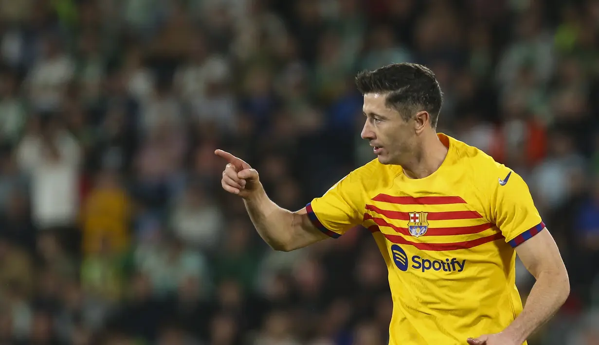 Robert Lewandowski mencetak dua gol dipertandingan ini.  (AP Photo/Alberto Saiz)