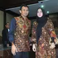 Gatot P Nugroho dan istri Evy Susanti usai menjalani Sidang Vonis di Pengadilan Tipikor Jakarta, Senin (14/3/2016). Hakim menjatuhkan hukuman penjara kepada Gatot selama 3 tahun dan denda 150 juta. (Liputan6.com/Faisal R Syam) 