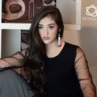 Polos, itulah kata yang terucap jika melihat wajah Ranty Maria.