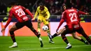 Tiga gol kemenangan Dortmund ke gawang AC Milan dilesakkan Marco Reus, Jamie Bynoe-Gittens dan Karim Adeyemi.  (Marco BERTORELLO / AFP)
