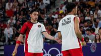 Ganda putra Indonesia, Fajar Alfian/Muhammad Rian Ardianto, pada pertandingan kedua Olimpiade Paris 2024, di Paris, Selasa (29/7/2024). (PBSI/Badmintonphoto/Yohan Nonotte)