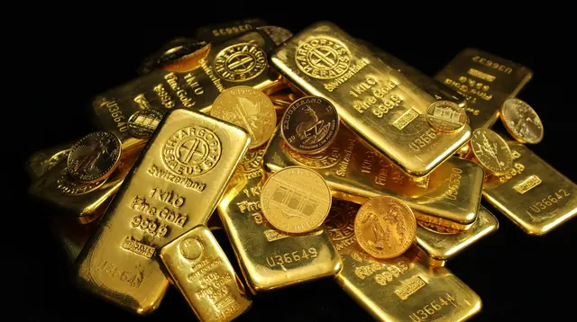 Harga Emas Dunia Merosot Dipicu Isu The Fed dan Perang Timur Tengah