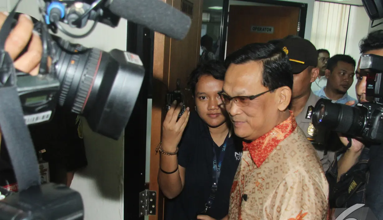 Didik Purnomo usai menjalani sidang perdana di Pengadilan Tipikor, Jakarta, Kamis (11/12/2014). (Liputan6.com/Andrian M Tunay)