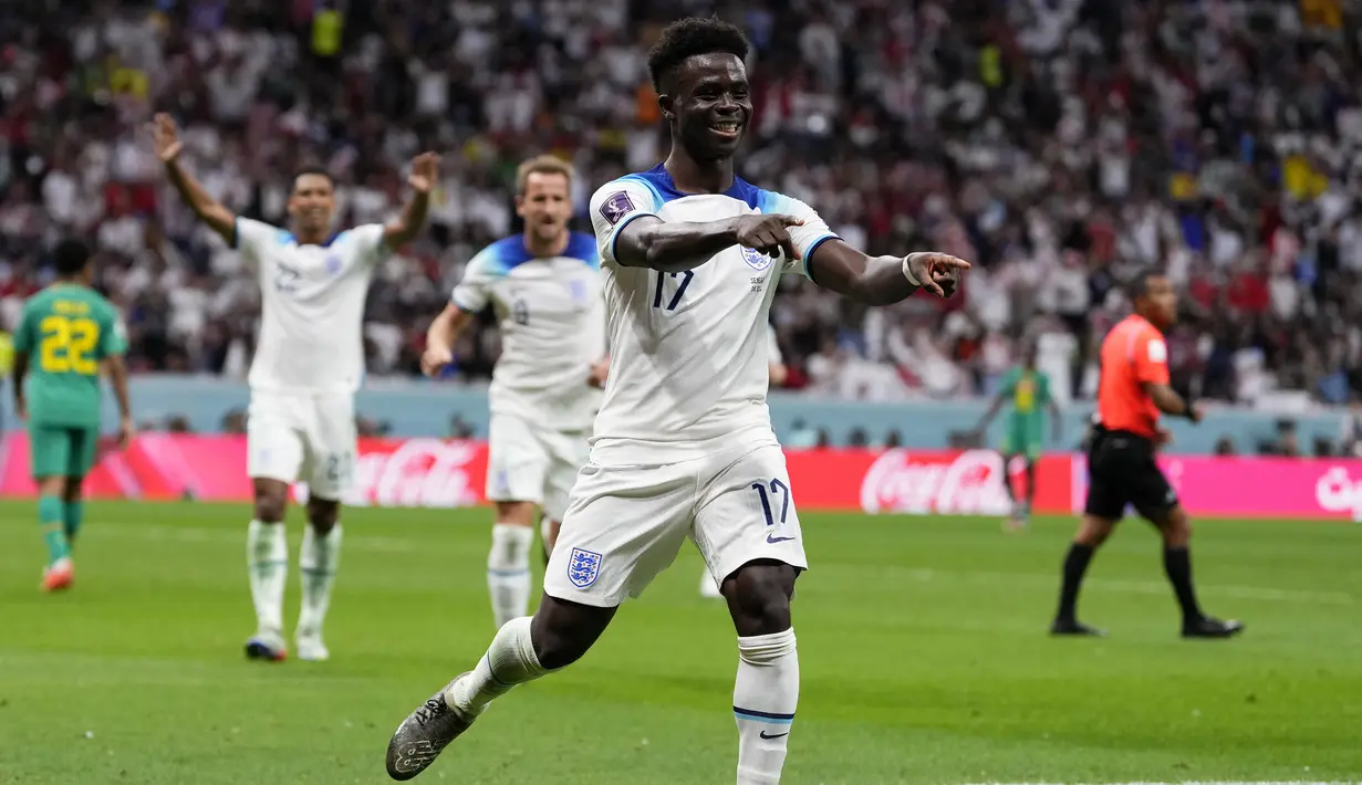 Gol Bukayo Saka menjadi gol ketiganya pada Piala Dunia 2022 yang menjadi Piala Dunia pertamanya. Pada fase grup, pemain milik Arsenal tersebut mampu menyumbang 2 gol yang dicetaknya pada matchday pertama saat menang 6-2 atas Iran. (AP/Manu Fernandez)