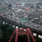 Kendaraan melintasi ruas jalan tol di kawasan Ancol, Jakarta, Selasa (13/1/2015). (Liputan6.com/Faizal Fanani)